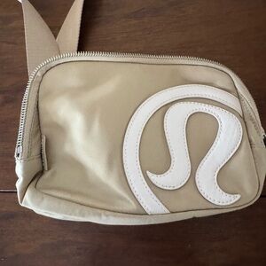 Lululemon Athletica Beige Crossbody Bag with White Logo